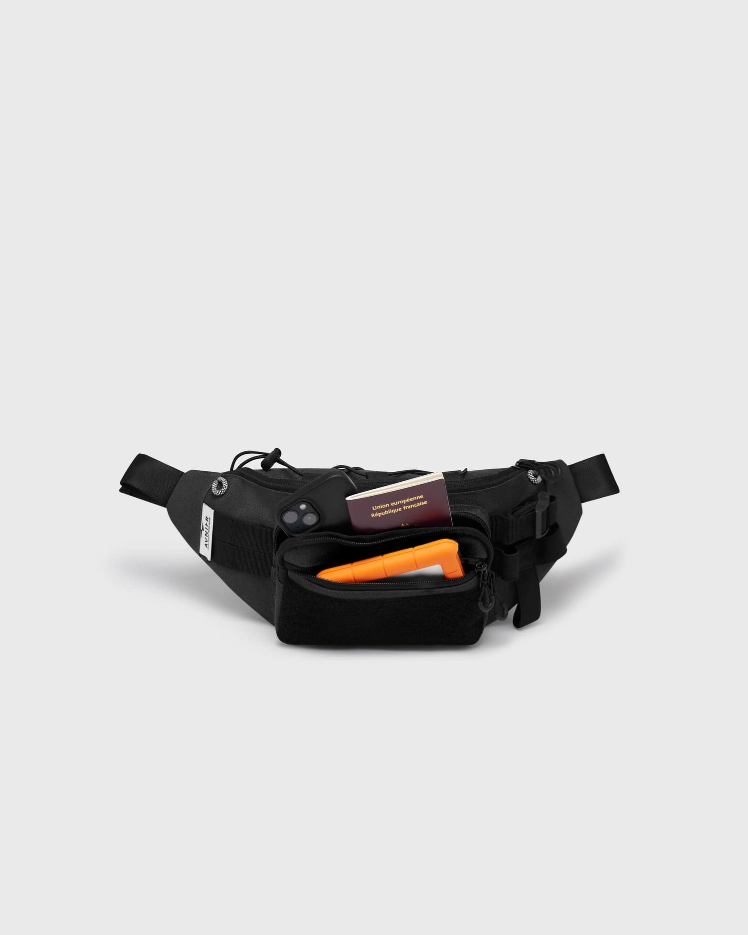 Banane noire Avnier ouverte, compartiment principal avec accessoires rangés. - noir